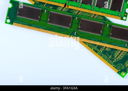 Several computer memory modules are placed RAM modules with green circuit boards integrated chips used for upgrades data processing Stock Photo