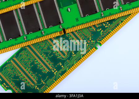 Computer memory modules are placed with intricate gold connectors, representing modern computer hardware Stock Photo