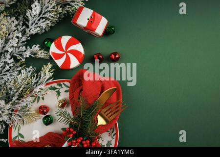 Christmas Dinner Place Setting with Copy Space and Festive Holiday Decorations Stock Photo
