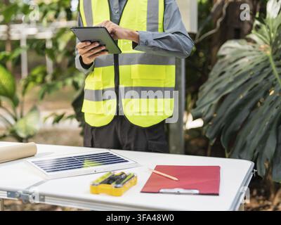 Asian engineer using tablet for digital monitoring and project management in engineering work Stock Photo