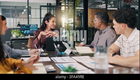 People, smile and discussion with laptop in boardroom, teamwork or risk management with info on web. Happy, colleagues and collaboration with tech Stock Photo