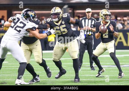 New Orleans Saints guard Jeremiah Wright (65) arrives for an NFL ...