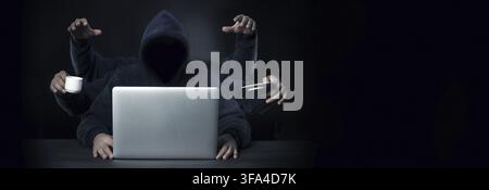 A programmer with six hands all a successful workaholic in the workplace Stock Photo