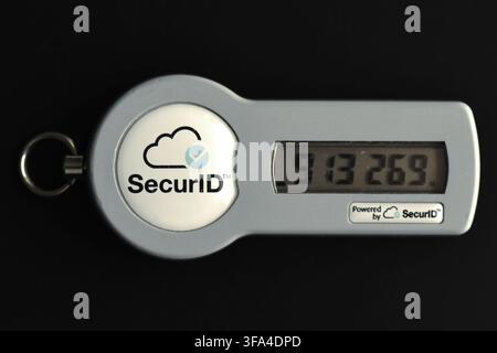 SecurID RSA secure access and authentication device for network security isolated on black Stock Photo