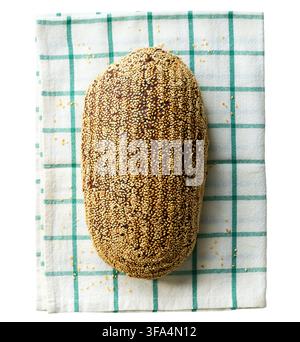 Loaf rye bread made from sourdough with whole grain flour with sunflower seeds and sesame, isolated on white background.Top view. Loaf  rye bread , is Stock Photo