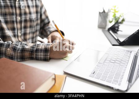 Online education and remote teaching concept using laptop for virtual classroom learning Stock Photo
