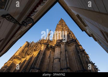 St. Vitus Cathedral at sunset in city of Prague, Czech Republic (Czechia). Metropolitan Cathedral of Saints Vitus, Wenceslaus and Adalbert, Gothic arc Stock Photo