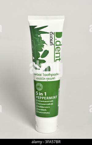 Thailandese herbal toothpaste tube, bilingual labeling in English and Thai Stock Photo