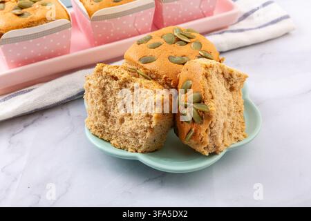 Date Nut Cupcakes Topped with Pumpkin Seeds Stock Photo