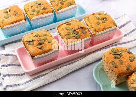 Date Nut Cupcakes Topped with Pumpkin Seeds Stock Photo