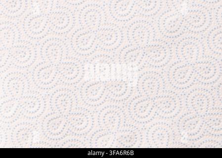 A minimalist horizontal fabric and paper background featuring a clean white kitchen towel surface with a delicate blue embossed dotted ornamental patt Stock Photo