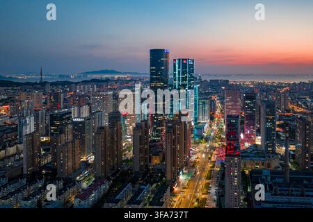 Qingdao city skyline at dusk Stock Photo