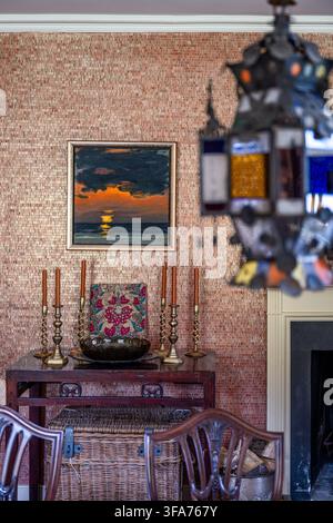 Decorative antiques and contemporary art with Moroccan lamp in Georgian home in the Scottish borders, UK. Stock Photo