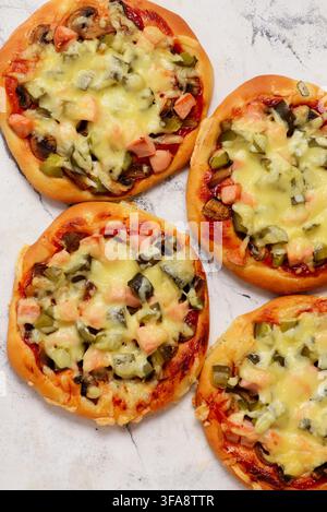 Close-up of appetizer pizzas.. Top view. selective focus Stock Photo