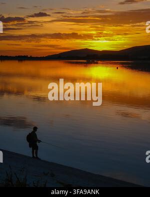 August 2026 - Sunset over the reservoir in Cheddar, Somerset, England, UK. Stock Photo