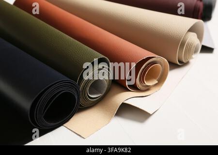 Textile industry and fashion design materials, rolls of colorful faux leather fabric for upholstery and crafting Stock Photo
