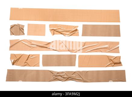 Packaging and shipping supplies, various pieces of brown adhesive tape with wrinkles and creases on a white background Stock Photo
