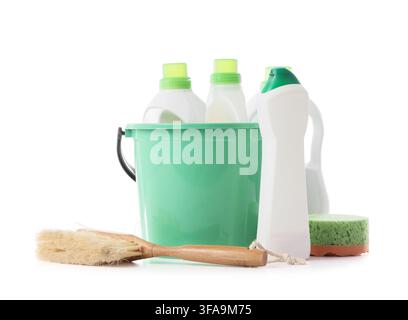 Home cleaning supplies and household chores concept bucket with detergent bottles brush and sponge on white background Stock Photo