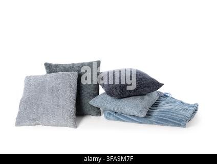 Home decor comfort and interior design, stack of soft blue and gray pillows with a cozy blanket on white background Stock Photo