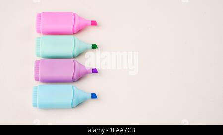 Pastel Highlighters Pens on White Background Stock Photo