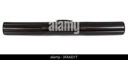 A tube with a handle for carrying and storing drawings and papers. Black plastic tube isolated on white background. Stock Photo