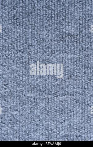 Vertical grey loop carpet fabric texture macro, showing soft woven fiber pattern for design background Stock Photo