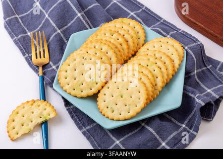 Round Scallion Seasoned Salted Crackers Stack Stock Photo