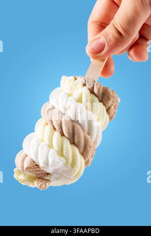 Twisted Spiral Chocolate Vanilla Ice Cream Bar in Hand Stock Photo