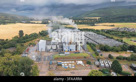 Rothes CoRDe Speyside Scotland steam from the biomass-fired CHP plant using wet draff from whisky distilleries Stock Photo