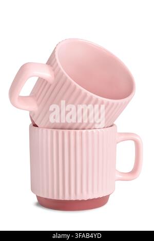 Two pink ceramic empty coffee cups isolated on white background Stock Photo