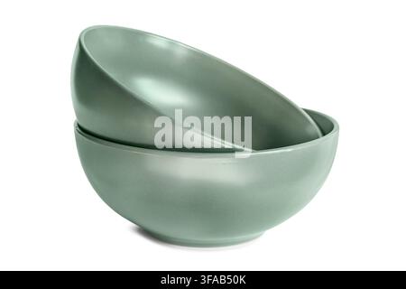 Two green ceramic empty bowls isolated on white background Stock Photo