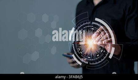 Young man using smartphone hand interacting with futuristic digital interface symbolizing innovation and progress. Stock Photo