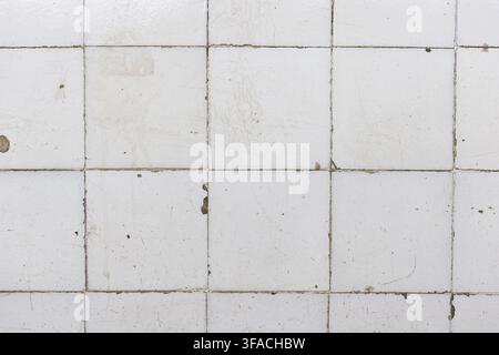 grunge white ceramic tile wall background texture Stock Photo