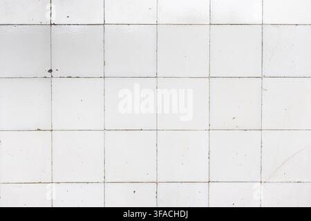 Retro white ceramic tile wall background texture Stock Photo