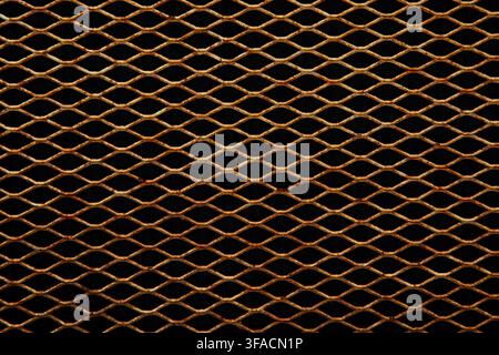 Rusty metallic diamond mesh grid background full frame texture. Stock Photo
