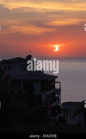 Sunset in partial solar eclipse after the Total Solar eclipse, Spain, 12th August 2026, seen from west coast Mallorca, Spain Europe. Stock Photo