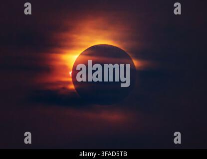 The moment of Total Solar eclipse of the Sun, seen from Mallorca Spain 12th August 2026. Solar flare or Prominence seen at 9 o'clock on the disc. Stock Photo