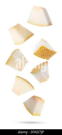 Fresh melon. Pieces flying in air on white background Stock Photo