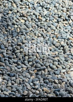 Natural Gray and Multicolored Pebble Stone Texture Background Stock Photo