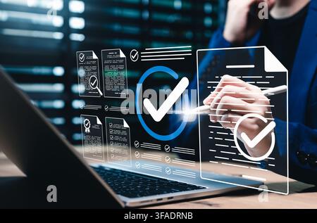 Document verification approval and compliance checklist concept. Professional using laptop with verified files, check mark, certificate, review form, Stock Photo