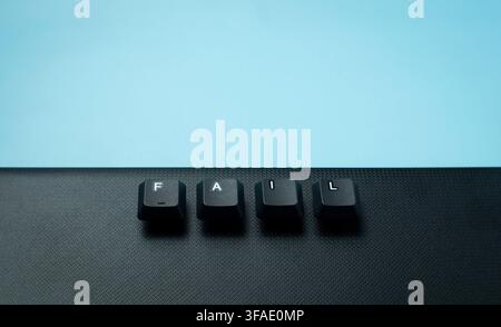 Fail word concept on a blue and black split background, representing failure, mistake, bad result, pressure, crisis, and learning from setbacks. Stock Photo