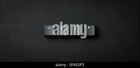 Help Request Concept With Keyboard Keys On Dark Background Stock Photo