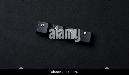 Help Request Concept With Keyboard Keys On Dark Background Stock Photo