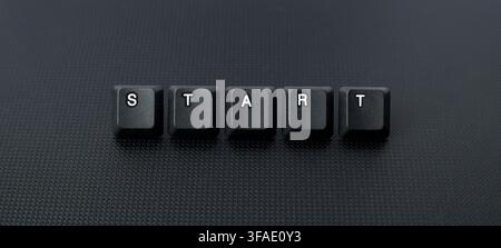 Start Button Concept With Keyboard Keycaps On Dark Background, symbolizing beginning, launch, action, productivity, project planning, and startup Stock Photo