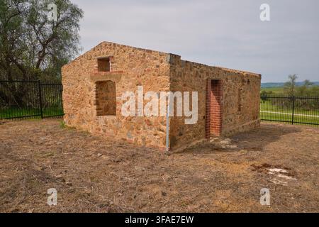 The restored, small, stone electrical switch hut, providing power to the complex. At the WWII Japanese POW campsite in Cowra, NSW, Australia. Stock Photo