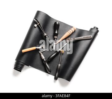 Leather crafting tools and supplies handmade leather goods artisan workshop hobby and creative craft isolated on white background Stock Photo