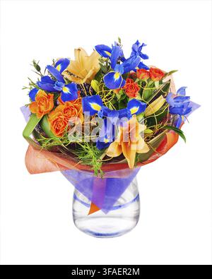 Flower bouquet from roses, lilies, iris and other flowers in glass vase isolated on white background Stock Photo