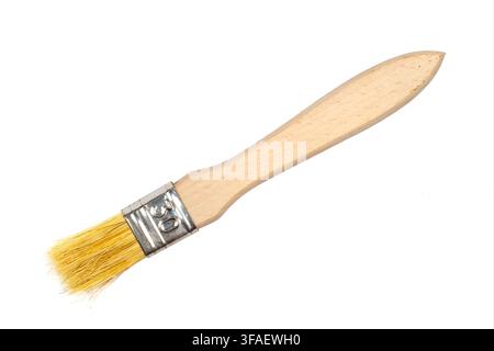 Wooden paint brush on a white background. Construction brush close-up. Stock Photo