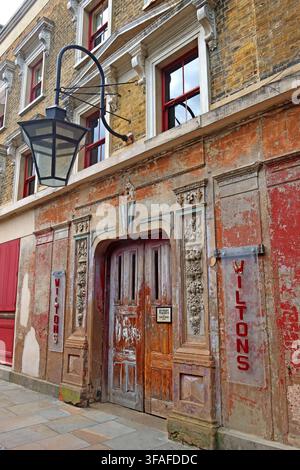 Oblique street view of the historic Wilton's Music Hall entrance in Graces Alley, Tower Hamlets, East London, England, UK. Stock Photo