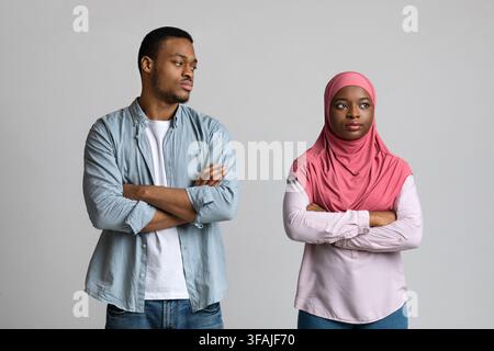 Frustrated black woman in hijab thinking about breaking up Stock Photo